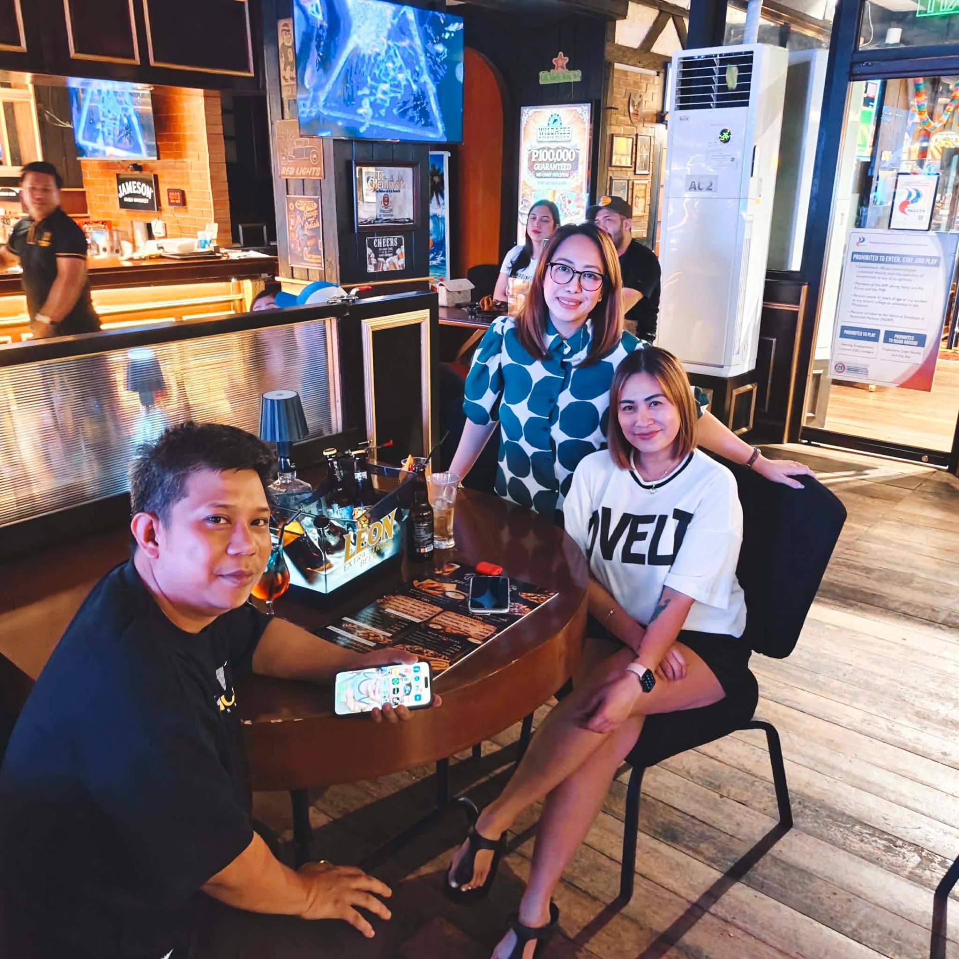 Guests enjoying drinks at a table